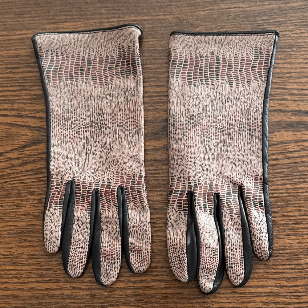 Elegant Black and Tan Gloves. Black on the inner part and snake skin look outer.
